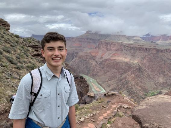 Daniel Casanova standing in front of a canyon