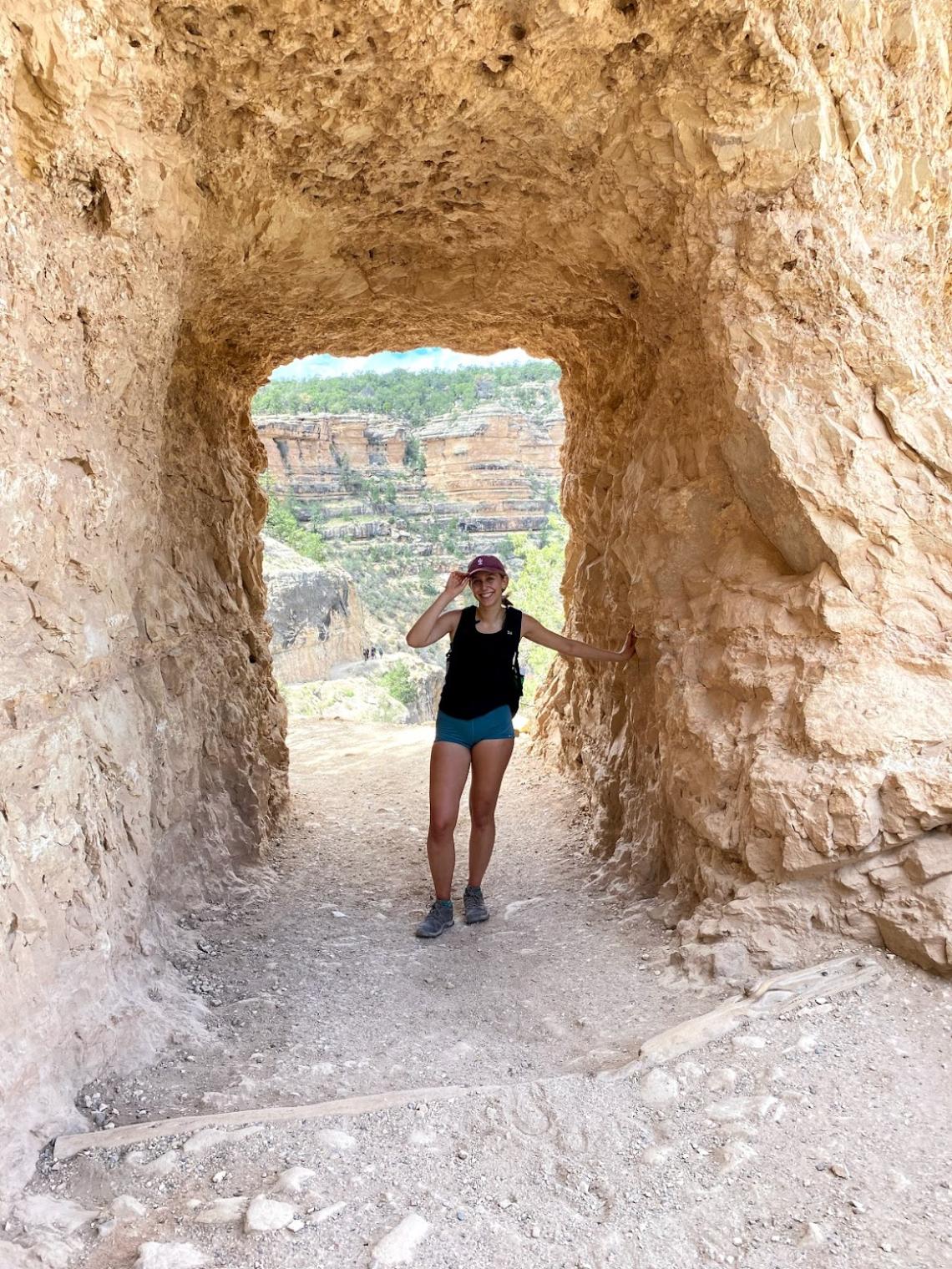 Stella Heflin in a rock tunnel