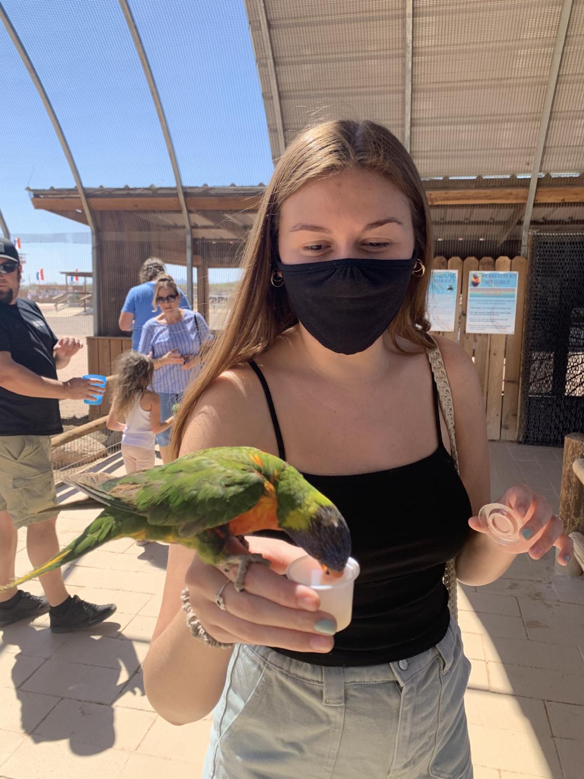 Sally feeding a bird