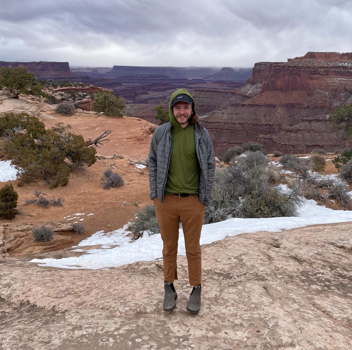 Nic Katz standing above the Grand Canyon