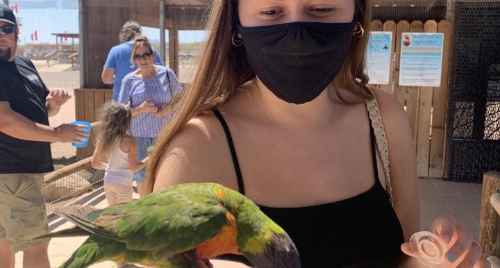 Sally feeding a bird