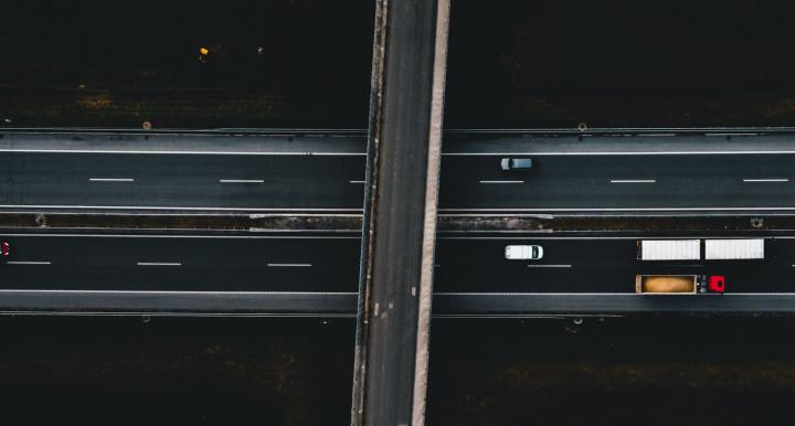 Cars driving across a highway